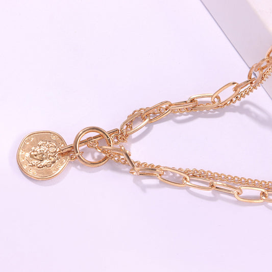 Chunky Goldkette mit Münz-Anhänger und Knebelverschluss
