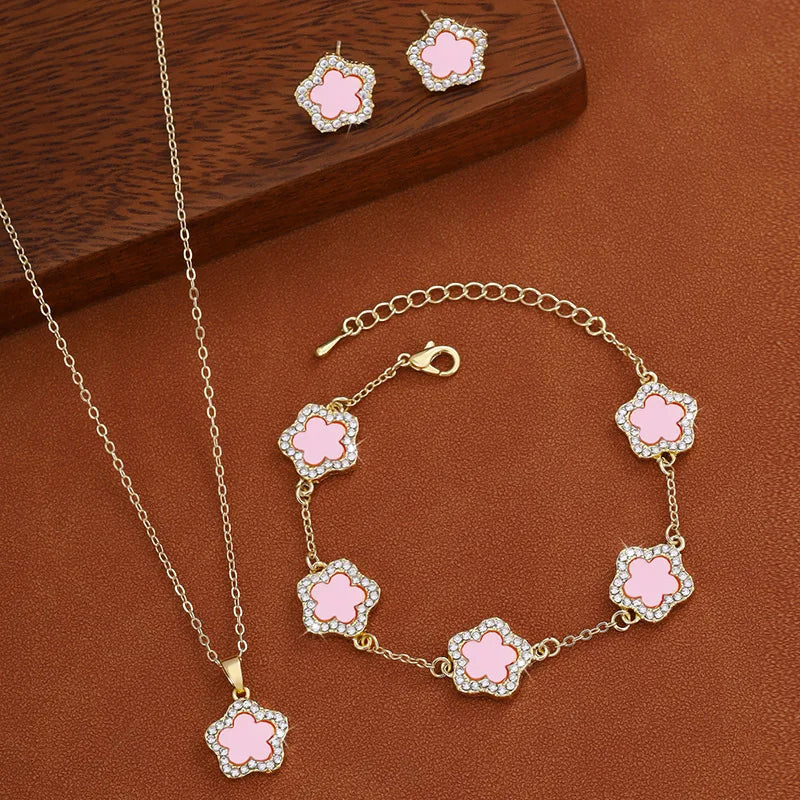 3-teiliges Schmuckset: Halskette, Armband & Ohrringe mit Fünf-Blatt-Blume in Rosa
