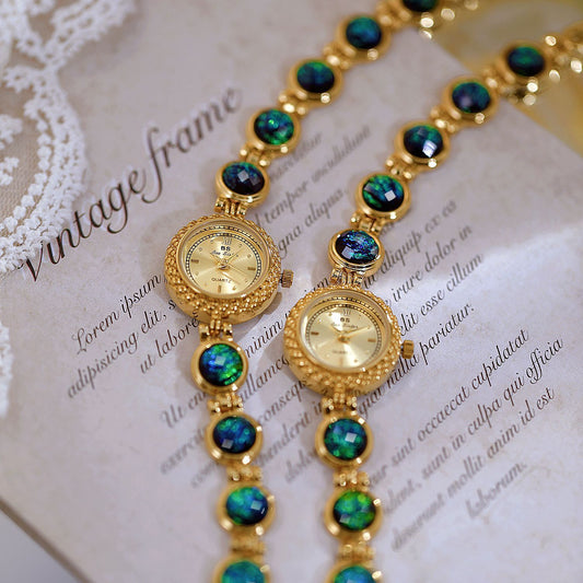 2 Malachit-Armbanduhren in gold