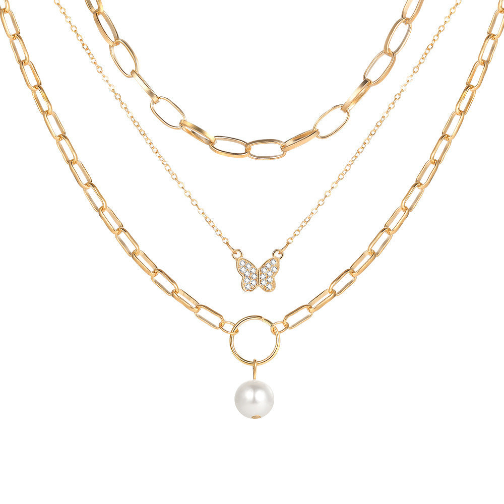 Goldenes Layering-Ketten-Set mit Schmetterling und Perle