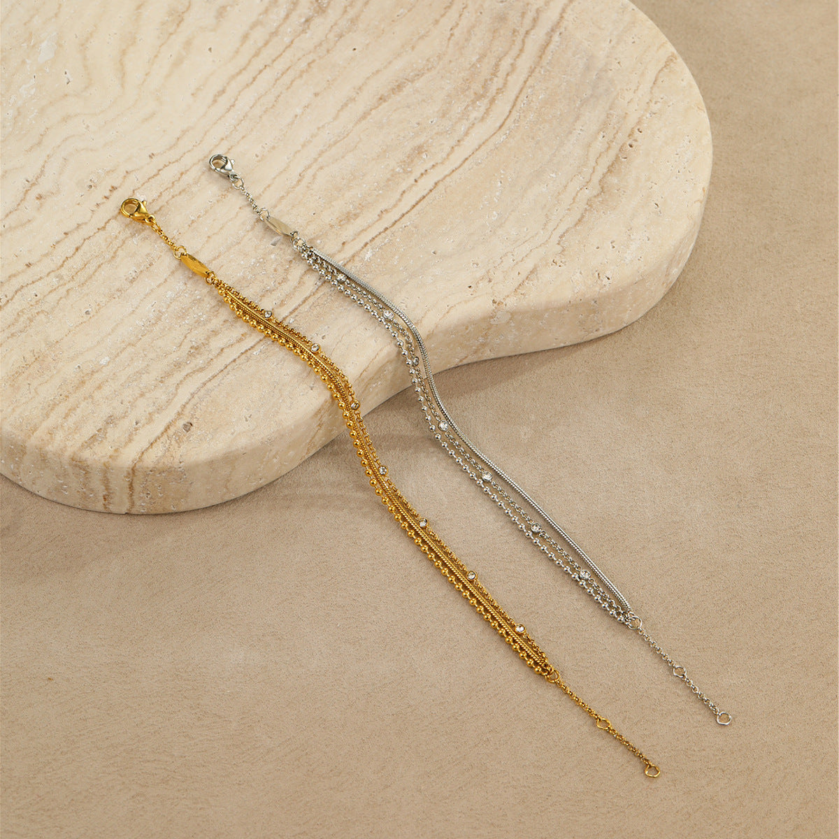Doppelarmband in Gold und Silber